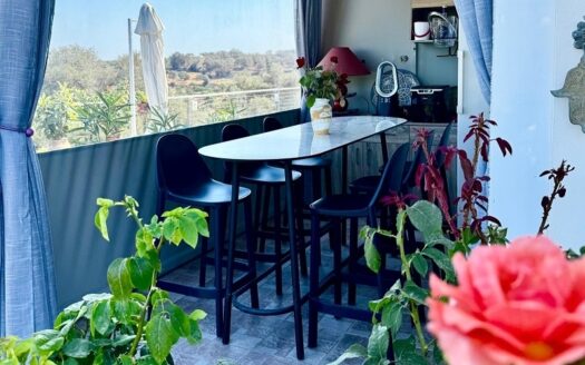 Charmant appartement avec piscine partagée et vue sur la mer à Agia Triada