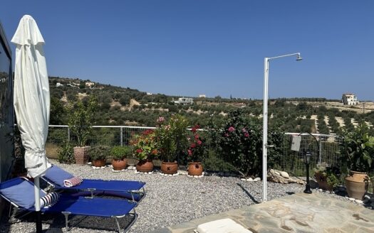 Charmant appartement avec piscine partagée et vue sur la mer à Agia Triada